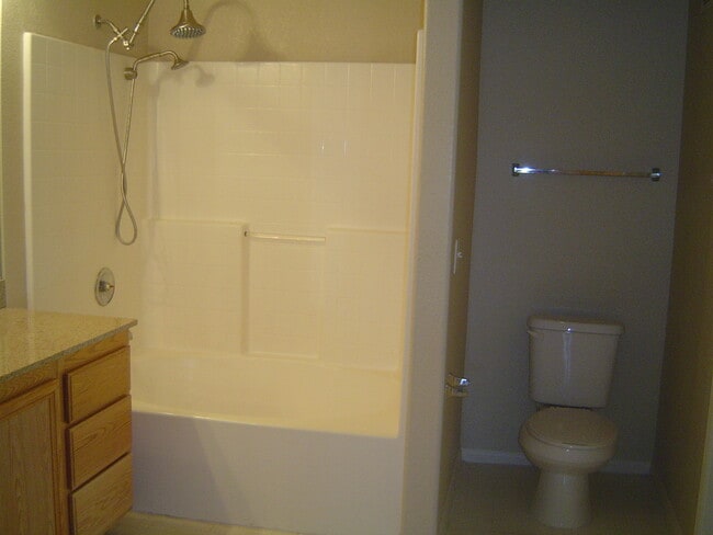 Building Photo - Move-In Ready Condo with Private Balcony & Modern Upgrades