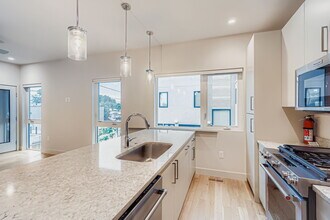 Building Photo - Swanky 1BR – New, Private Garage, Storage,...