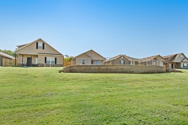 Building Photo - Charming Curb Appeal Meets Modern Comfort in the Monaco Plan!