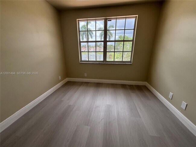 Building Photo - 5450 NW 94th Terrace