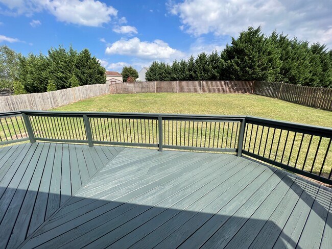 view from the back of the house in private fenced in yard - 11810 White Pine Dr