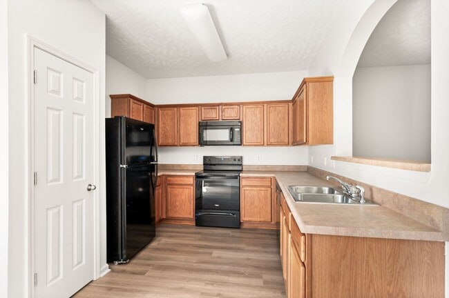 Building Photo - Stunning 3BR/2.5BA Updated Townhome in Pri...