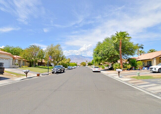 Building Photo - "Charming Oasis: 3-Bedroom Cathedral City Retreat with Pool, Fireplace, and Granite Kitchen!"