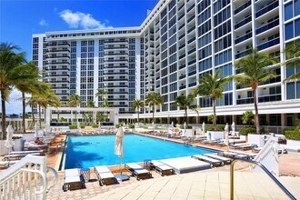 Building Photo - 10275 Collins Ave