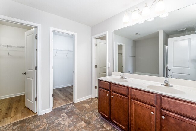 Building Photo - Spacious 5-Bed, 3.5-Bath Residence with 4,003 Sqft, Master on 1st Floor, Elegant Design, & Versat...