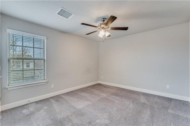 Building Photo - Minutes from I-49! 4BR/2.5BA Home