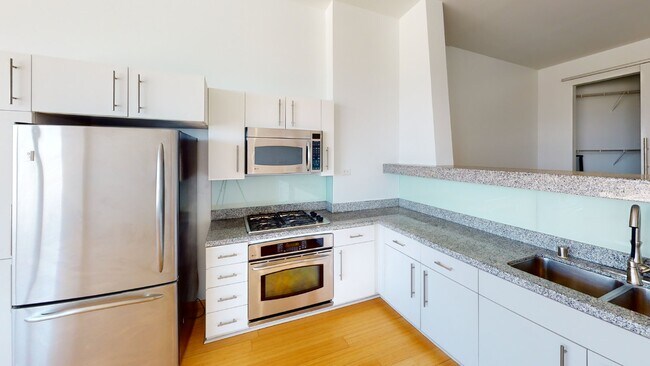 Building Photo - Sky-High Urban Living at 1100 Wilshire! St...