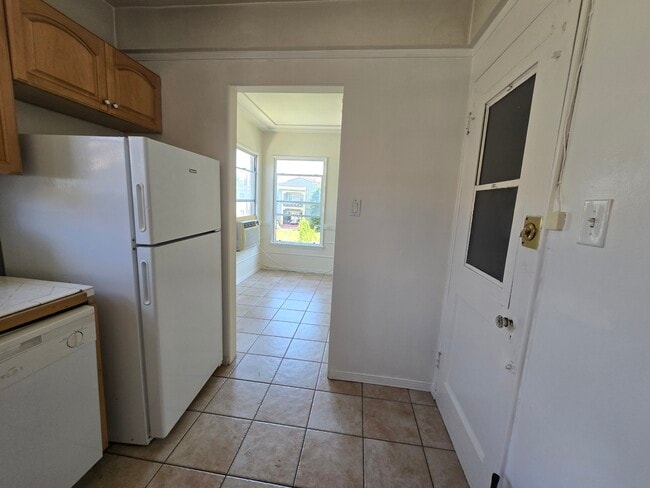 Kitchen view to dining room - 1233 S Orange Grove Ave