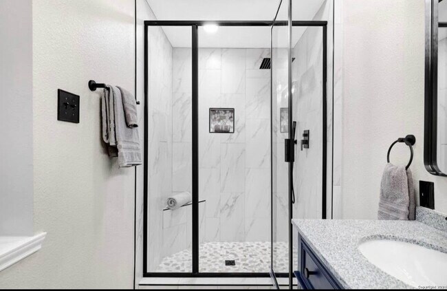 Building Photo - "Charming 4-Bedroom Home with Elegant Gran...