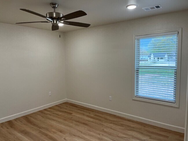 Building Photo - Introducing a newly constructed 3-bedroom, 2-bathroom house in the desirable location of Russellv...