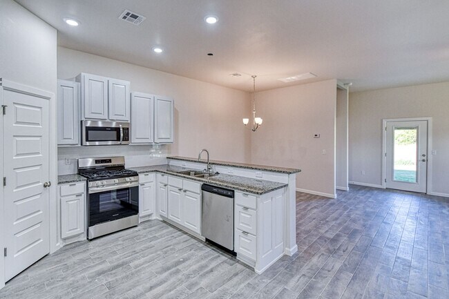 Building Photo - Brand New Construction! Lawn care provided!