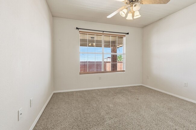 Building Photo - 4 Bedroom 2 Bath with Solar on a Large Corner Lot