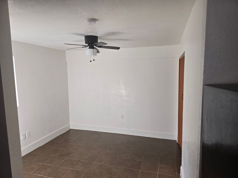 1st living room or bedroom w/ closet & ceiling fan - 6410 10th Ave