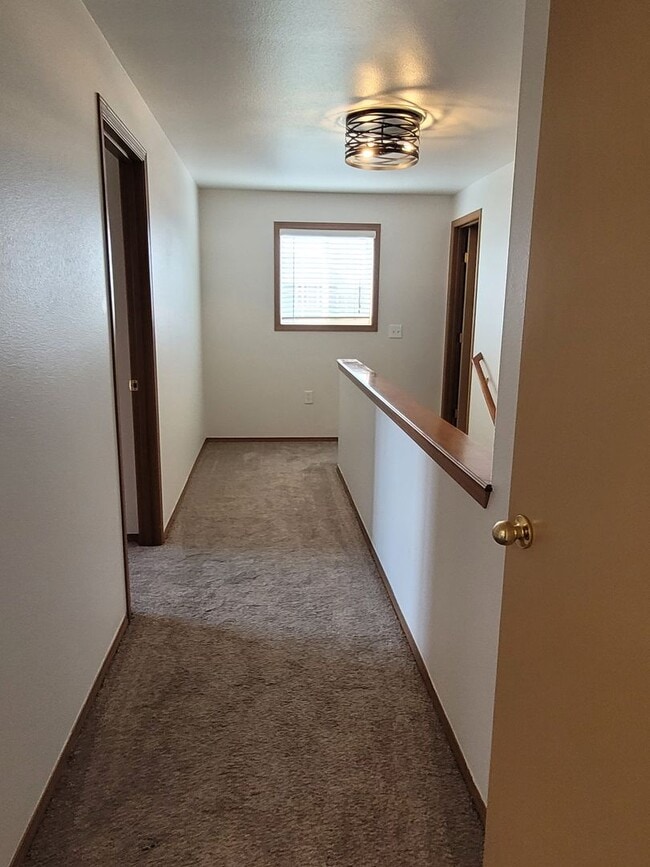 Building Photo - August Rent FREE - 4 Bedroom / Triple Car Garage