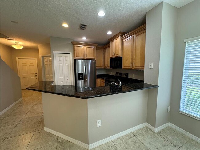 Building Photo - 8552 Trail Wind Dr