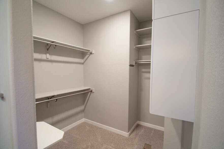 Primary walk-in closet - 1810 Volterra Way