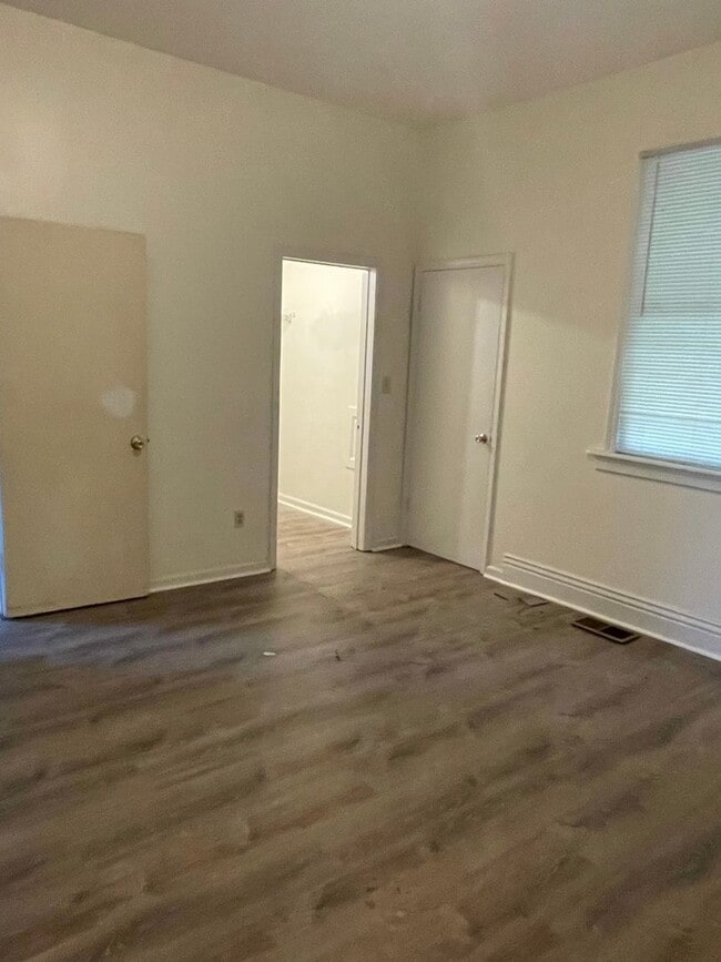 Building Photo - Updated three bedroom two bathroom home in...