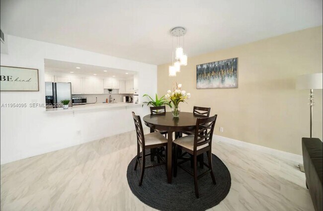 Building Photo - 19370 Collins Ave