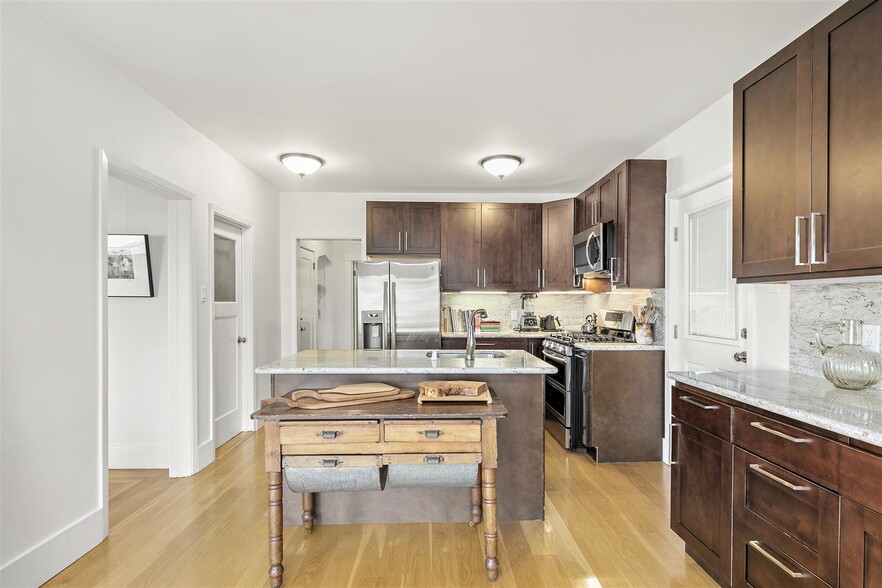 Kitchen with stainless appliances - 306 3rd St