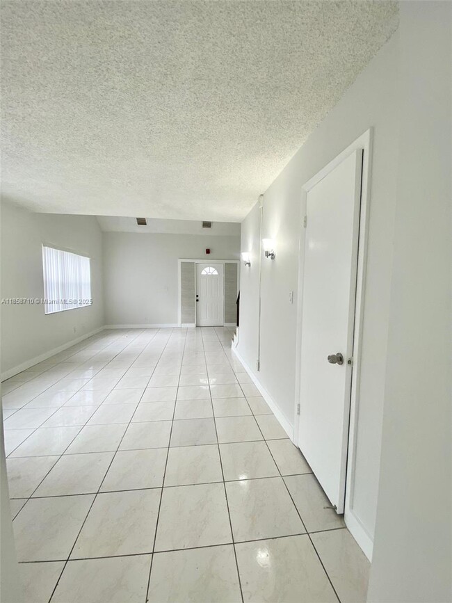 Building Photo - 3200 Coral Springs Dr