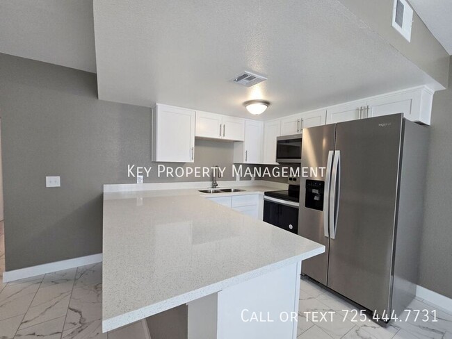 Building Photo - COMPLETELY REMODELED 2BR 1BA CONDO IN N LA...