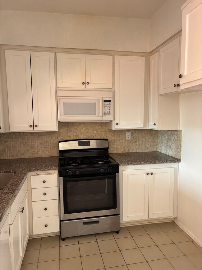 Building Photo - 4441 Woodman Ave