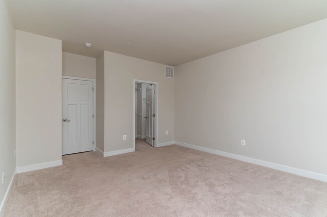 Building Photo - Townhouse with 1-Car Garage, Rooftop Deck ...