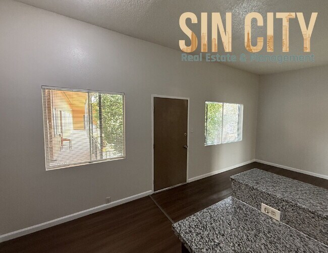 Building Photo - Discover Urban Comfort: Spacious Second Floor 1-Bedroom Oasis at Lyn Capri