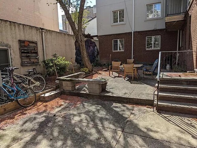 Building Photo - One Bedroom with office Trinity on Fabric Row