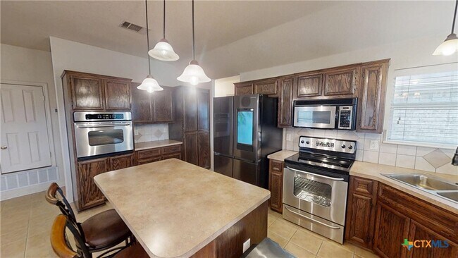 Building Photo - 5601 Hunters Ridge Trail