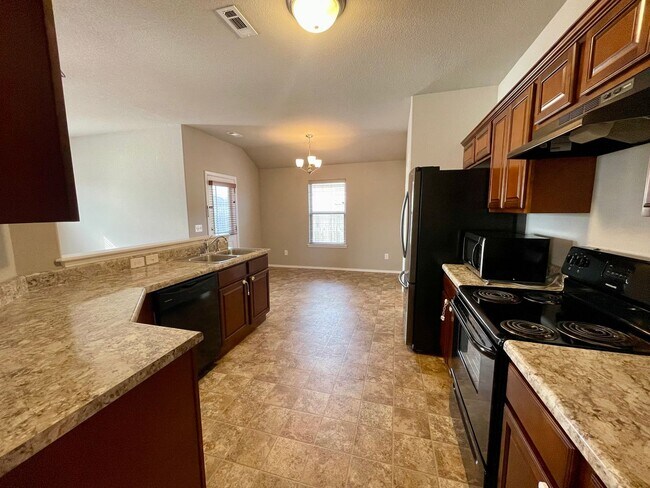 Building Photo - Spacious 3-Bedroom Springdale Home with Fenced Yard