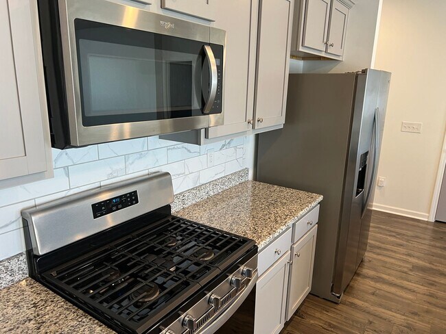 Building Photo - Four-Bedroom, Three-Bath, Unfurnished Hous...