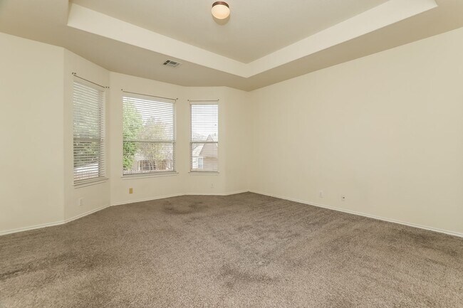 Building Photo - Spacious & Sun-Filled 4BR Retreat with Open-Concept Living and Versatile Dual Living Areas