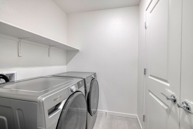 Building Photo - FULLY FURNISHED BRAND NEW TOWNHOME WITH 3 BEDROOMS + 2 CAR GARAGE