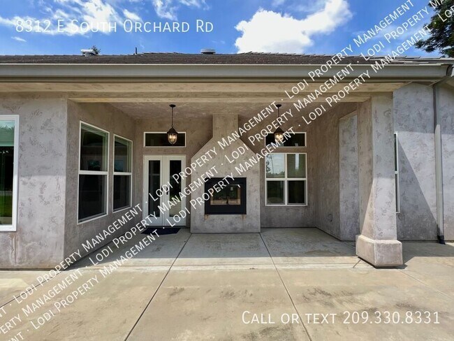 Building Photo - 8312 E Orchard Rd