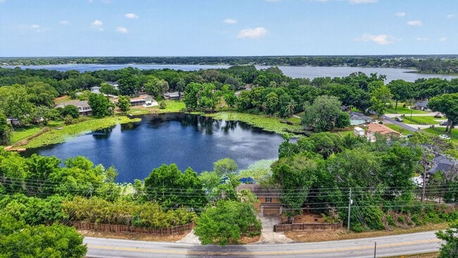 Building Photo - Available Now! Waterfront Living at Its Best – Pool, Decks & Gated Privacy