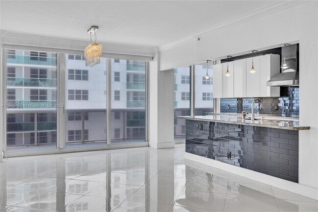 Building Photo - 9559 Collins Ave