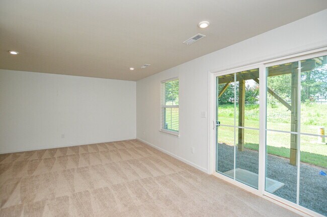 Building Photo - 3 Bedrooms | 2.5 Bathrooms | Lower-Level Flex Room | Approximately 1,978 Square Feet | 2-Car Gara...