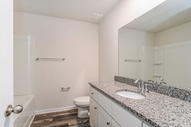 Building Photo - FIRST MONTH FREE - 3BR Townhome • Full Kitchen • Garage + Driveway