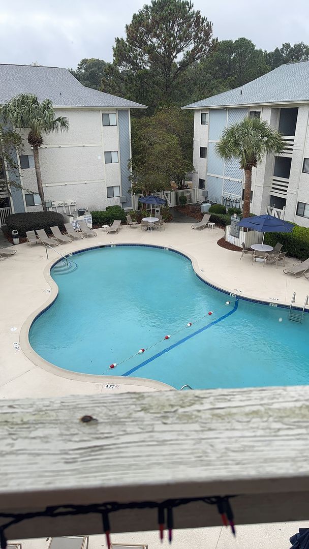 Building Photo - Fiddler's Cove Condo with Pool View- Walk to the Beach!
