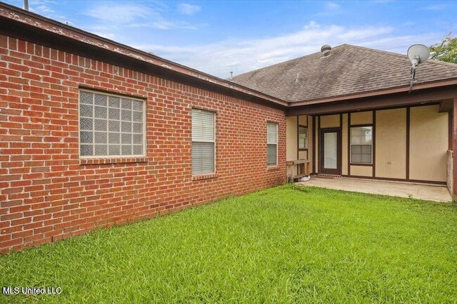 Building Photo - 409 Sand Stone Pl