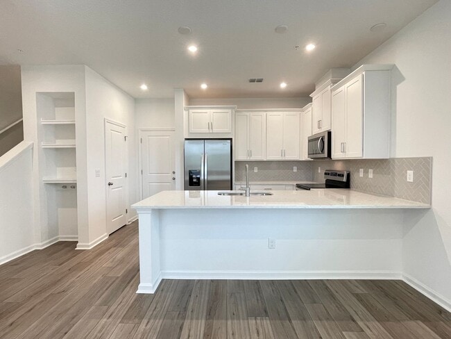 Building Photo - Newer 4 Bedroom, 2.5 Bath Corner Unit Town...