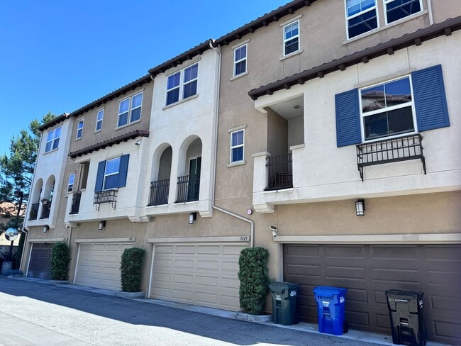 Building Photo - Stylish 3-Story Townhome with Balconies & Open-Concept Living
