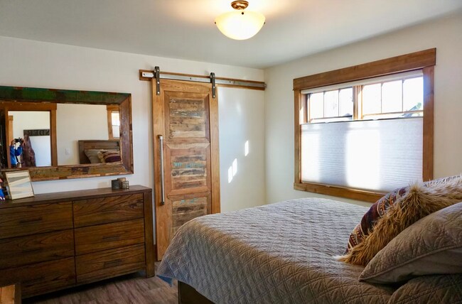 Bedroom with eastern exposure - 201 NW Harriman St