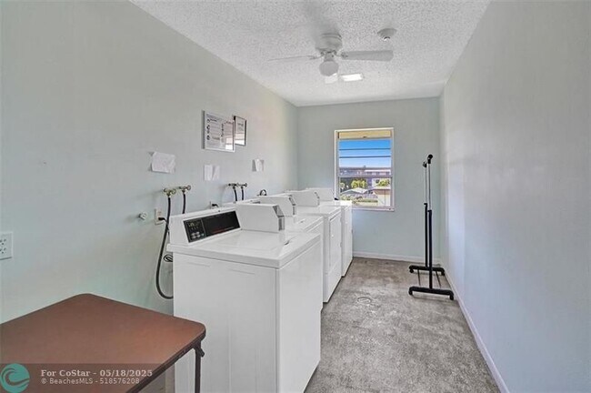 Building Photo - 4990 E Sabal Palm Blvd