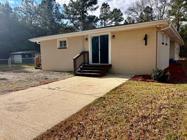 Building Photo - NOW AVAILABLE! 3 Bedrooms/1 1/2 Bath with Double living room space.