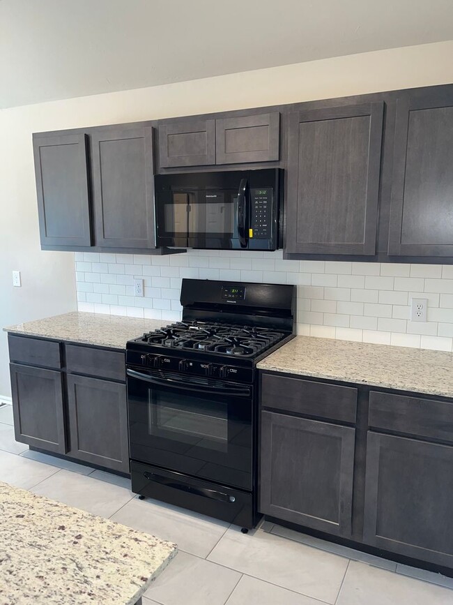 Building Photo - First Month Free! Nearly new home - built ...