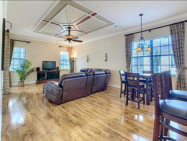 Building Photo - Luxury Living in Woodland Lakes Preserve: Fully-Furnished