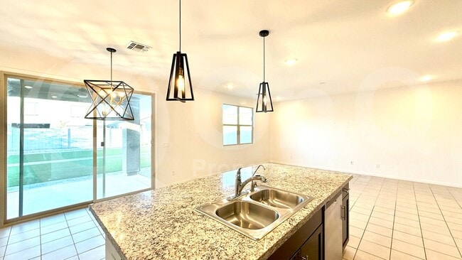Building Photo - 40414 W Sunland Dr