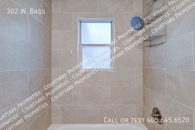 Building Photo - 302 W. Bass-